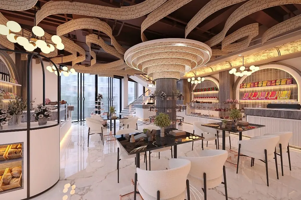Haldiram's flagship showroom, wide bakery and café floor beneath the storytelling ceiling