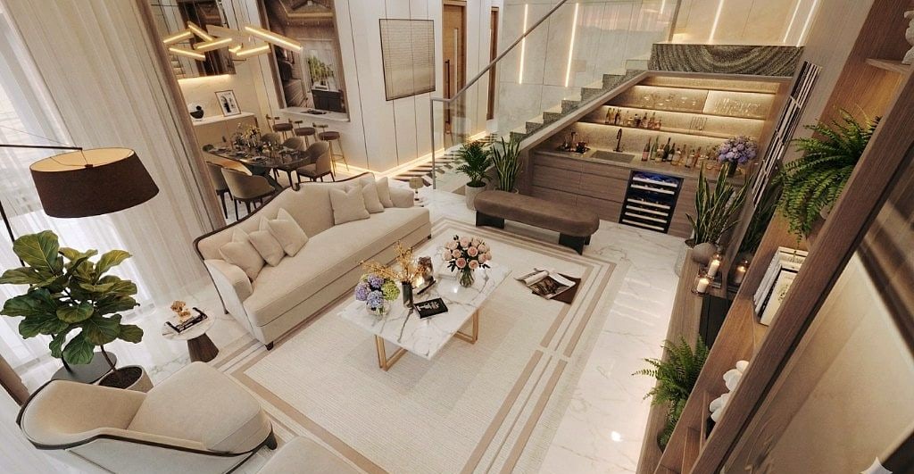 Top-down view of the Murooj villa living room showing the full furniture layout and the under-stair bar